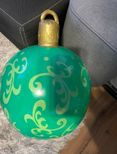 Jolly Giant: Inflatable Christmas Ornament Ball for Festive Cheer